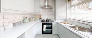 Organised shared kitchen with food storage in a young professionals' house share