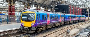 Merseyrail train at Liverpool Central station used by young professionals for commuting