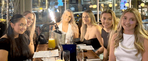 Young professionals enjoying a meal after work in one of the best restaurants in Liverpool